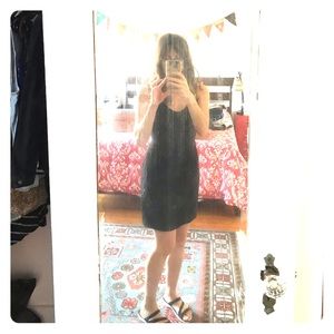 Short, black V-neck dress by Silence and Noise